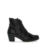 Bottine à lacets noirs en cuir lisse