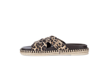 Mules léopard en cuir